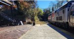 Going away shot of Pepsi can heritage unit 160 on train 151.  New stairs being constructed to the left.